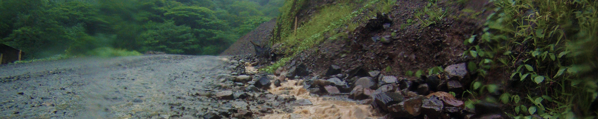 mountain road during rainstorm